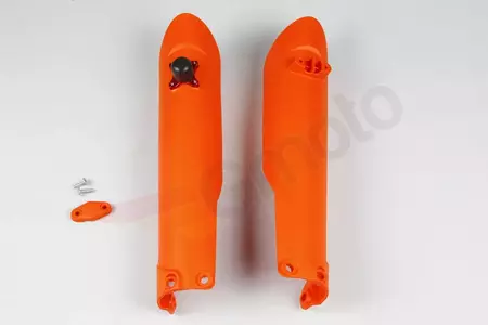 Pokrovi sprednjih amortizerjev s ključavnico UFO oranžne barve-1